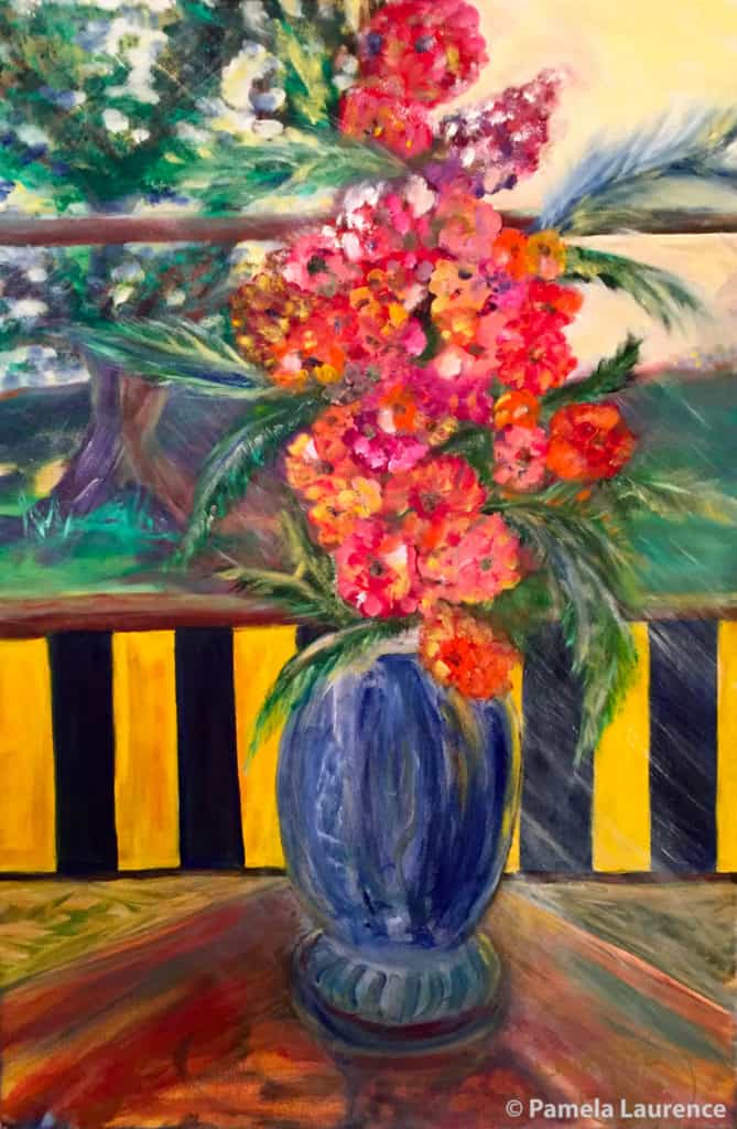 vase of flowers on balcony